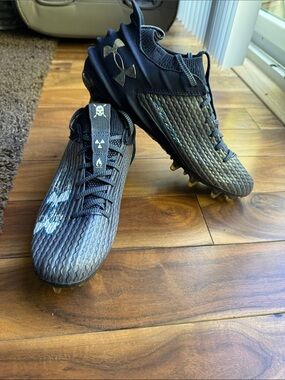 Under Armour Men’s Black Football Cleats with Metallic Logo